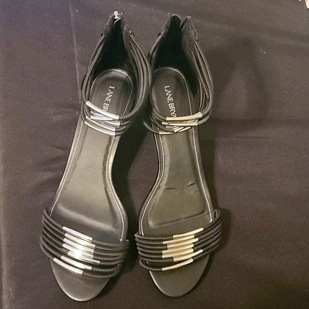 Lane Bryant black wedges with chrome detailing. Size 10W